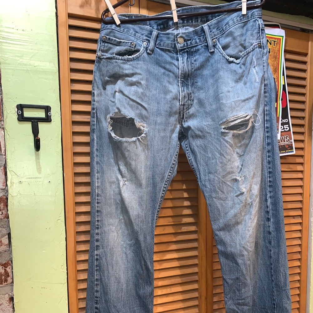 Ripped men’s Levi’s jeans. Size 34 x 32